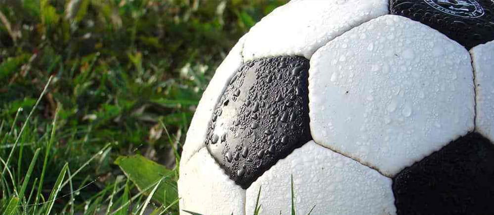 Featured image for “Why are soccer balls black and white?”