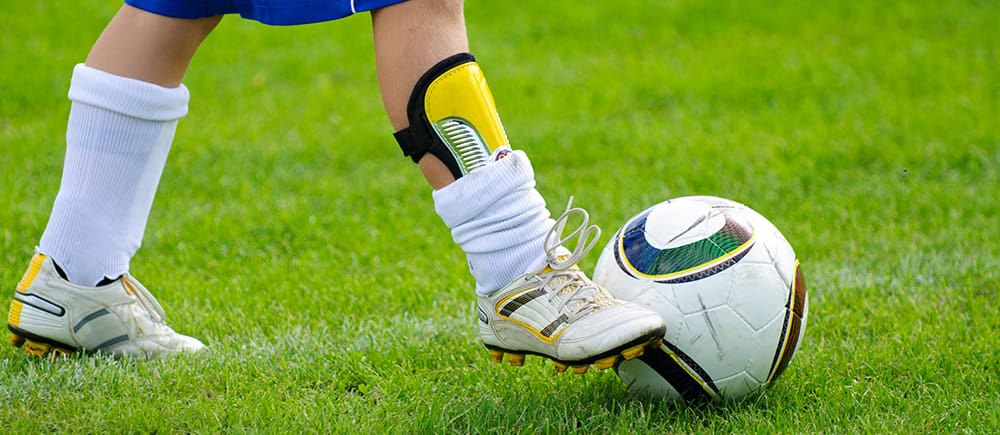 The Proper Way to Wear Soccer Shin Guards with Socks - SportsRec